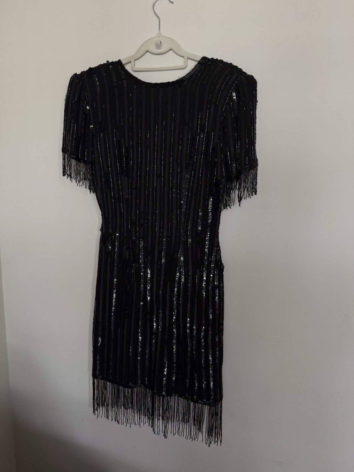 True vintage Stenay black sequin dress with fringe detail . 100% silk size 4