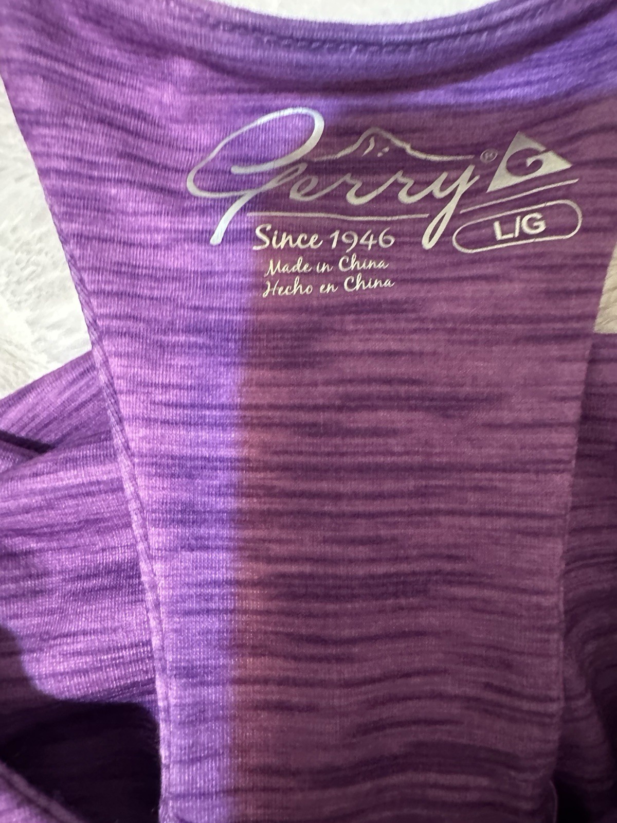 Gerry women’s sleeveless active or athletic dress in heathered purple color