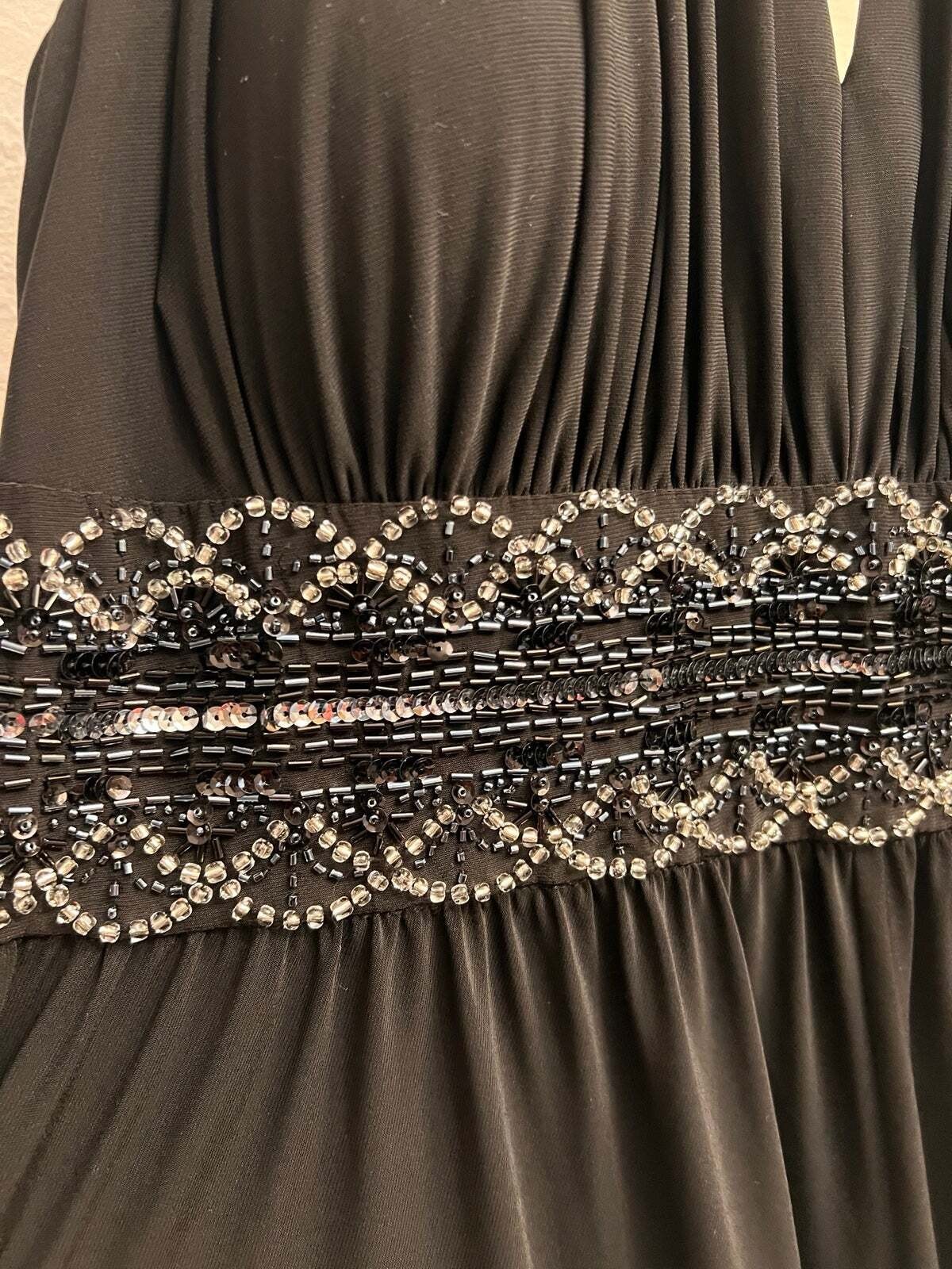 Elegant Black Sleeveless Maxi Dress with Beaded Waist Detail